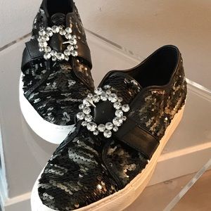 Glittery van styled - Black sequins everywhere.